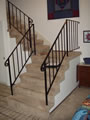 Before: carpet/iron L shaped stair