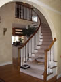 Before:  carpet/wood curved stair 